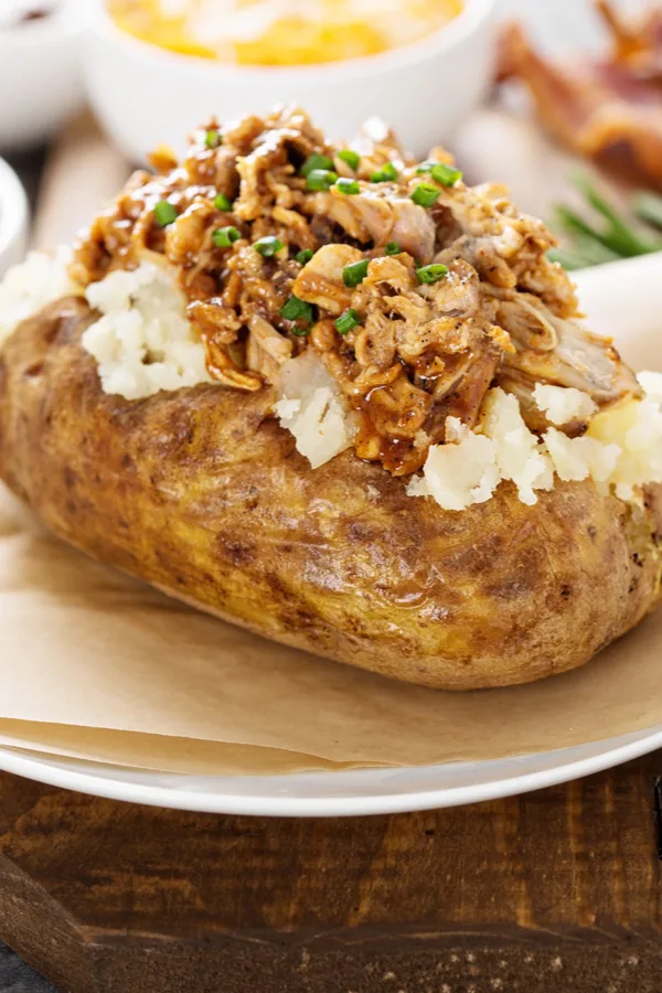 potato topped with pulled pork 