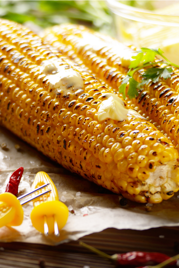 grilled sweet corn with butter on top 