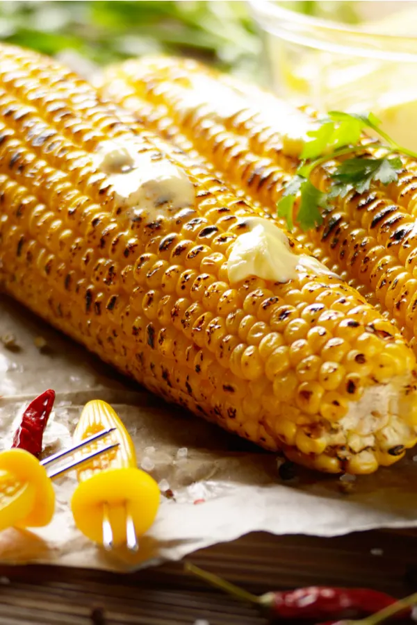 grilled sweet corn with butter on top 