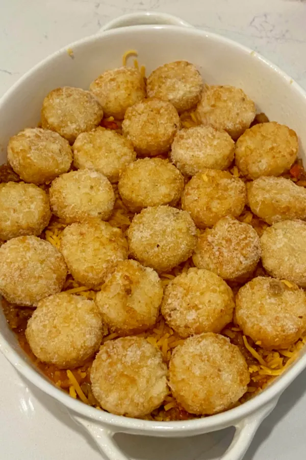 tater tots on top of casserole filling 