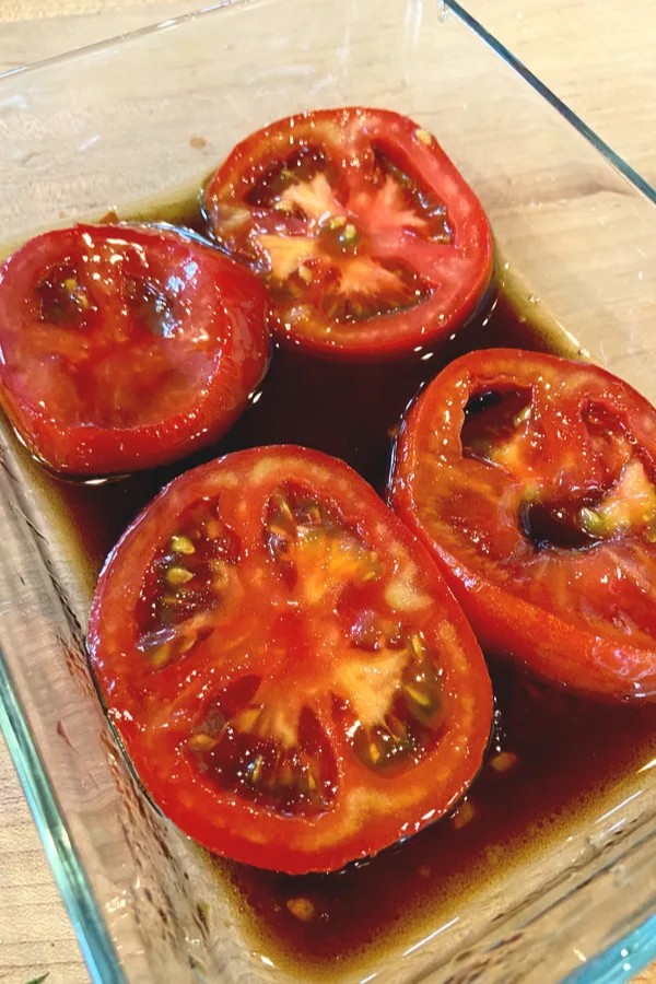 tomato slices in oil and balsamic