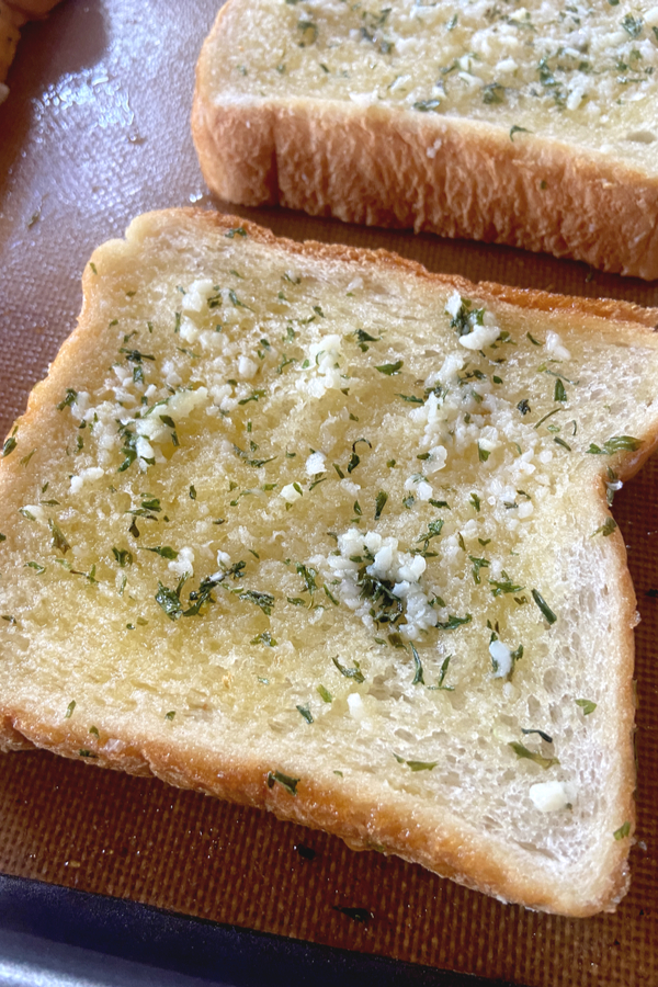 garlic butter and parsley on bread