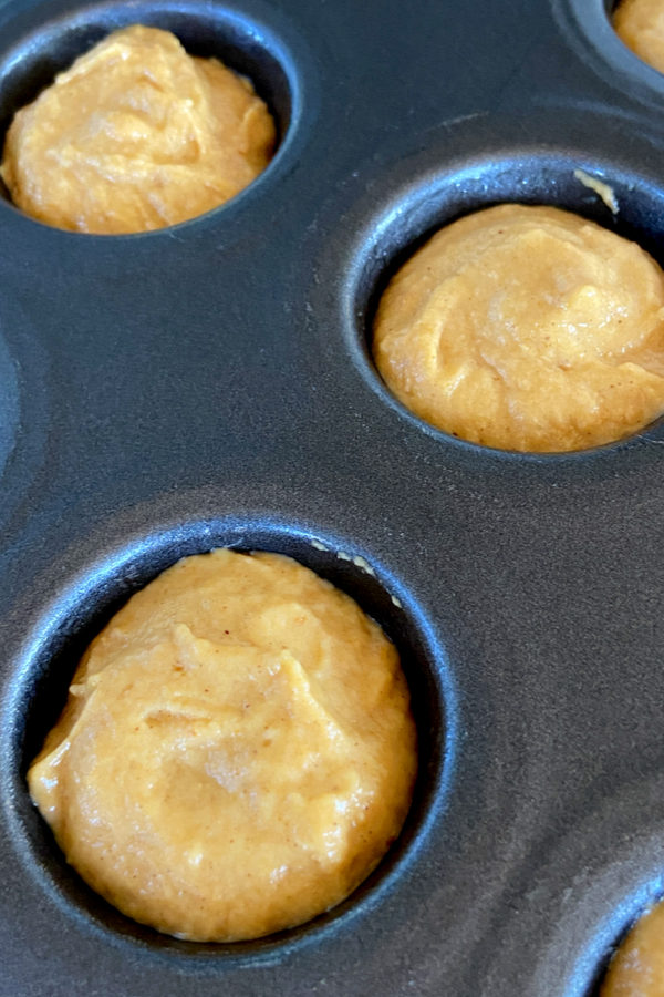 batter in mini muffin pan