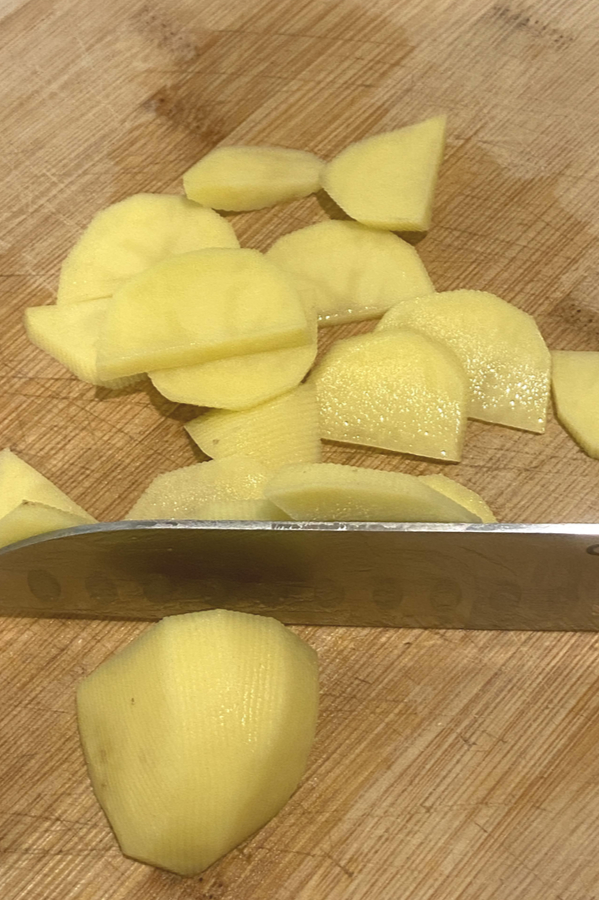 Yukon gold potatoes sliced in half circles