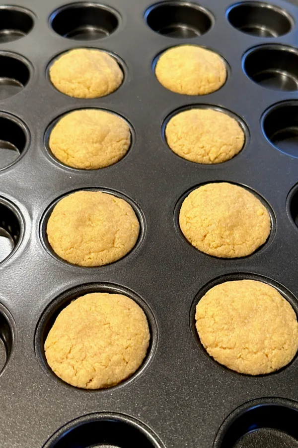 peanut butter cookies in a mini muffin pan 