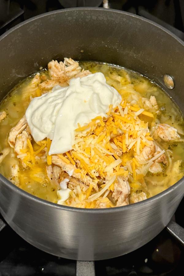 sour cream and shredded cheese in soup