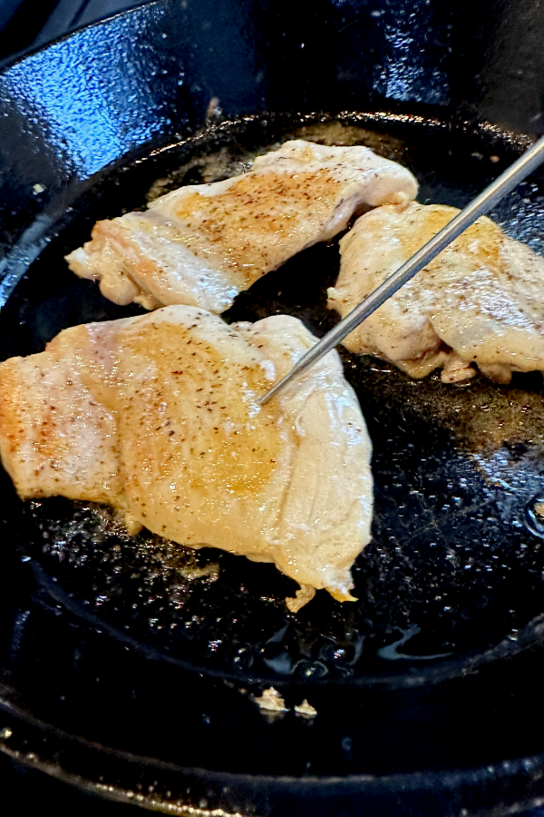chicken thighs with probe thermometer