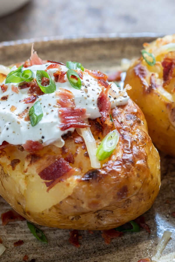 twice baked potatoes topped with sour cream