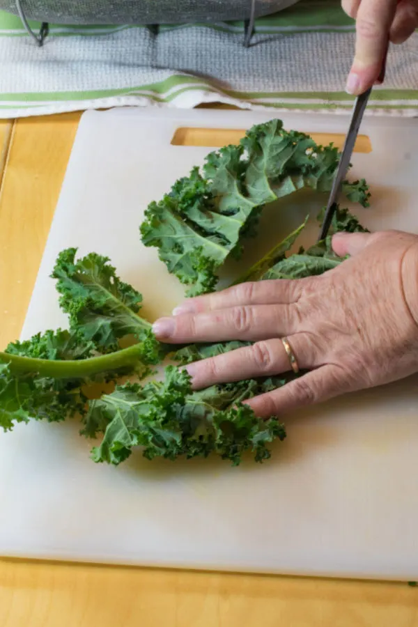 removing stem of kale 