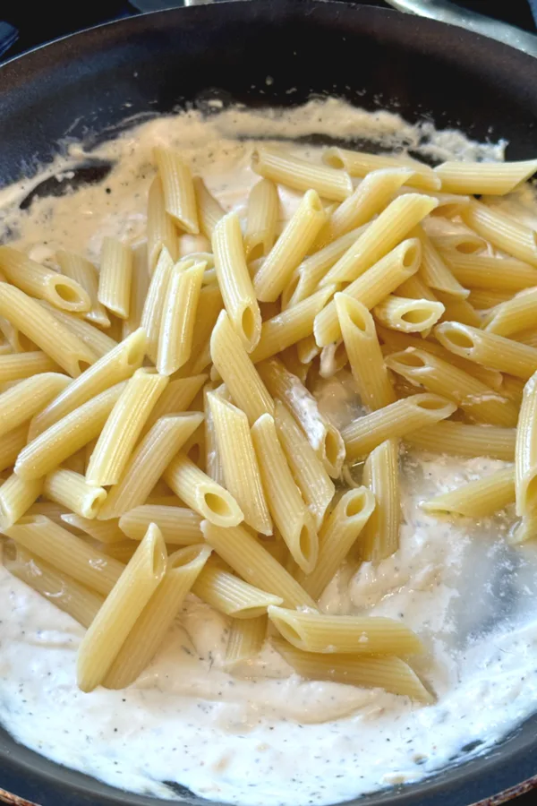 cooked penne noodles