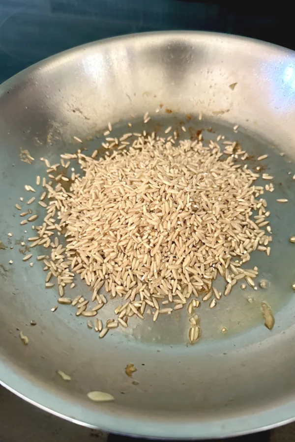 brown rice in skillet 