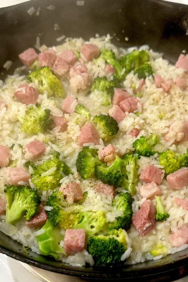 ham and rice casserole cooking in a skillet 