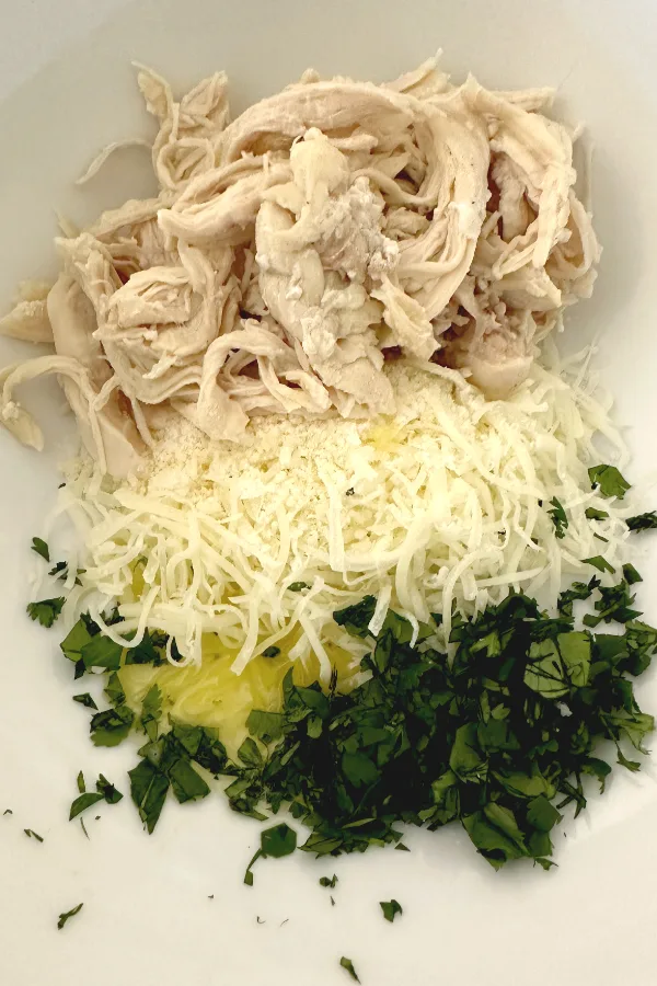 shredded chicken, cheese and parsley 