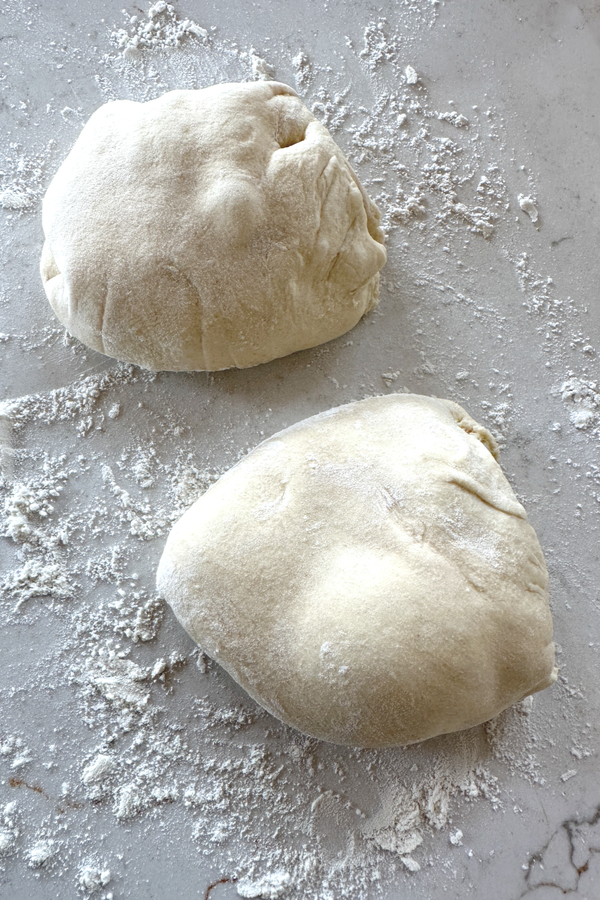 dough divided into two round balls