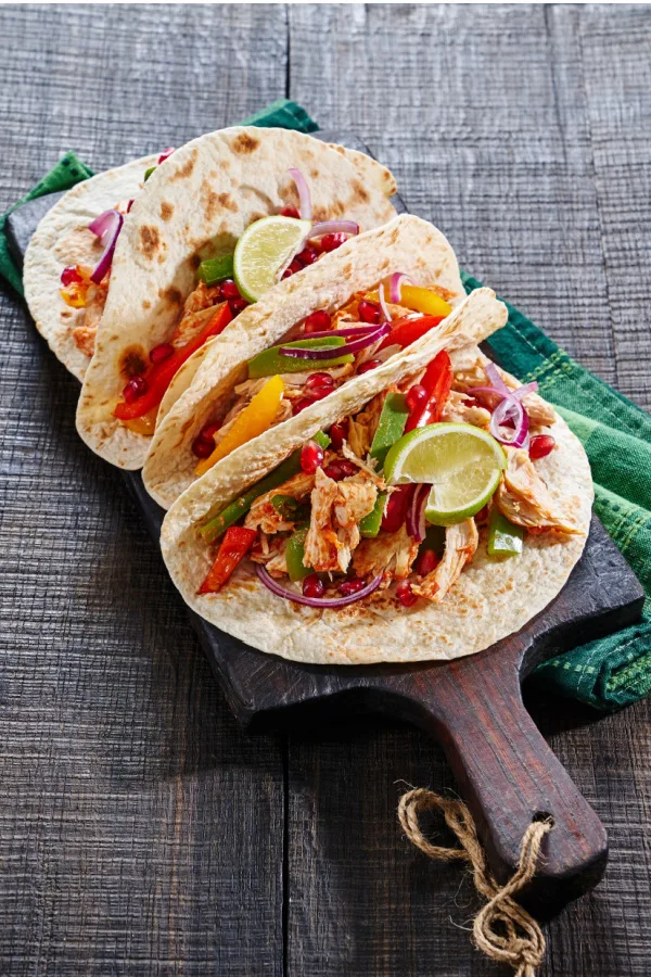 chicken and sautéed peppers in tortilla shell