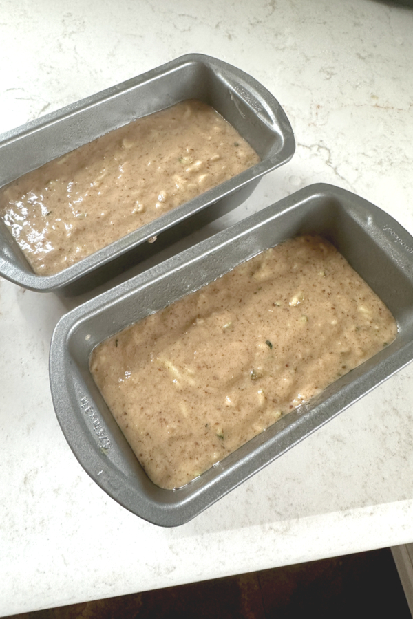 2 mini loaves of zucchini bread on cooling rack