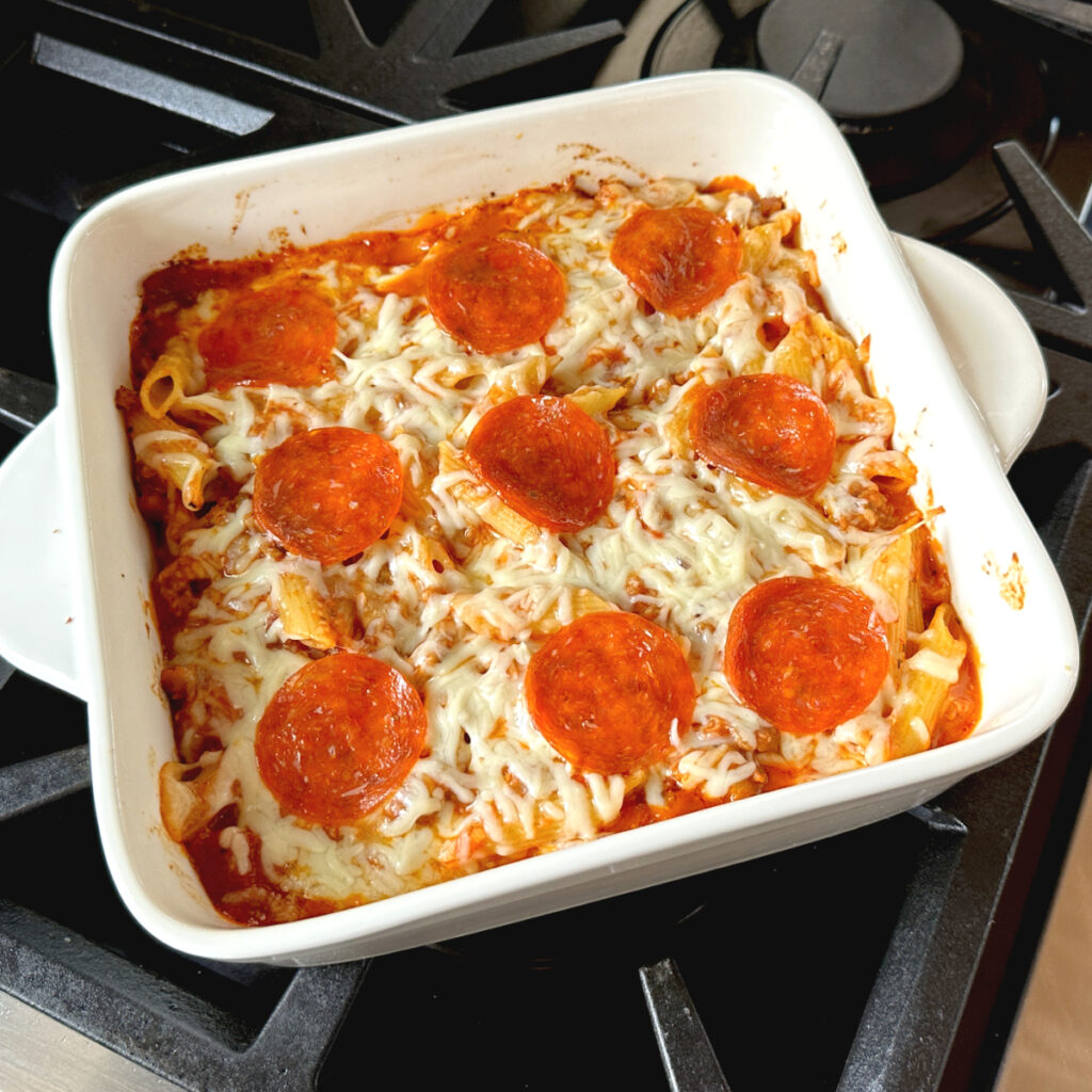 easy pizza casserole in white baking dish