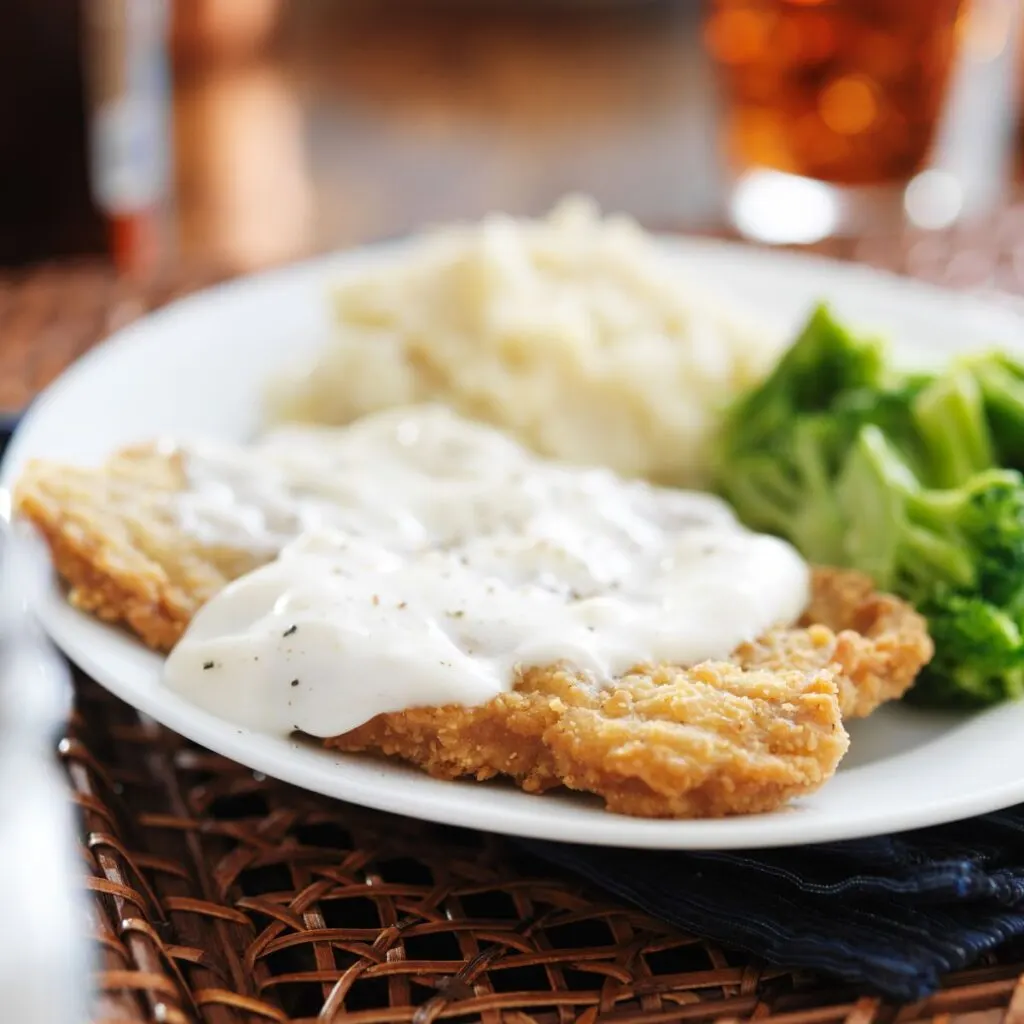 Chicken Fried Steak with Mashed Potatoes and Peppered Cream Gravy Recipe -  (4.1/5)