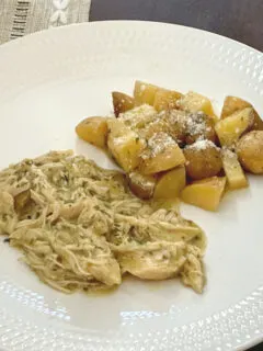 crock pot ranch chicken and potatoes on white plate
