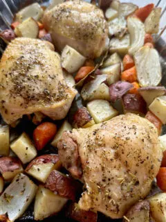 chicken thighs & potatoes dinner in baking dish