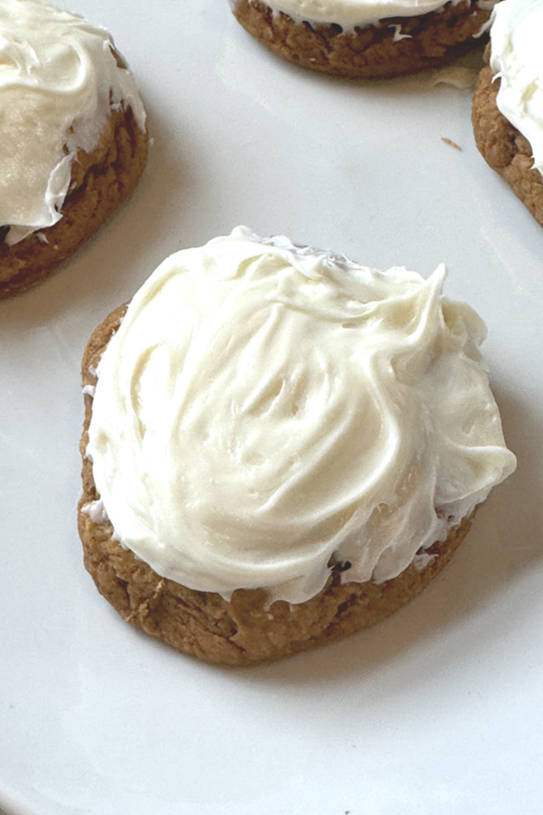 cream cheese frosted pumpkin cookie