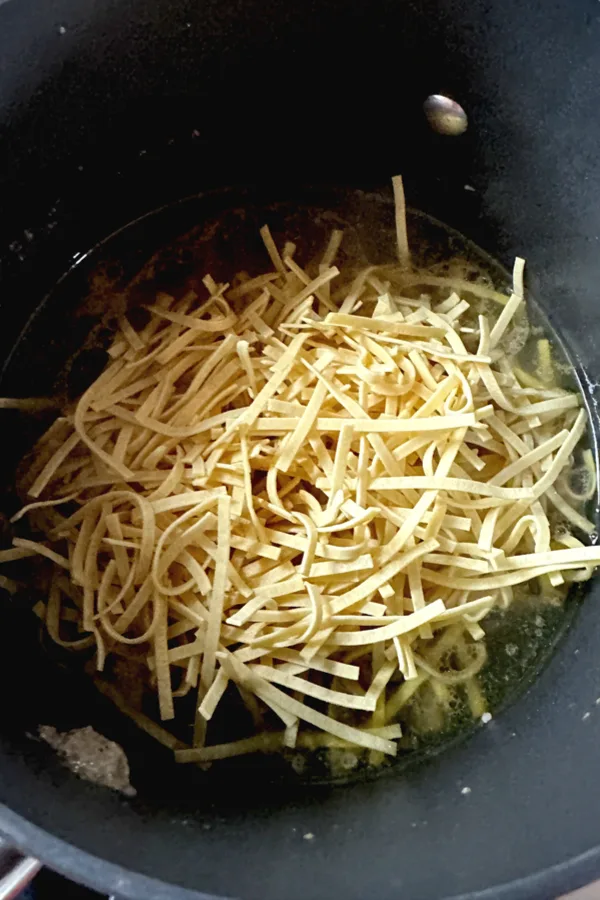 kluski egg noodles in pot