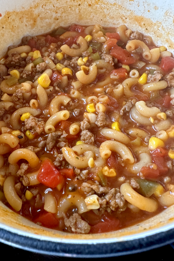 elbow pasta, ground beef, tomatoes, and corn.