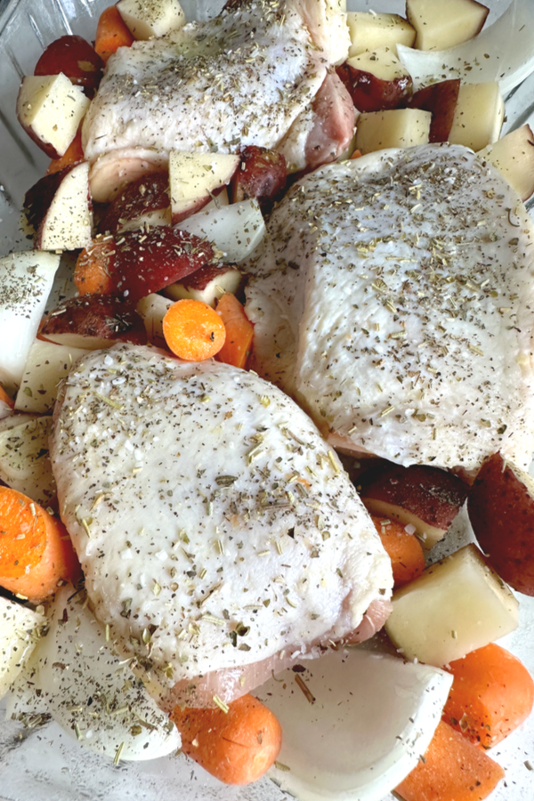 chicken thighs and potatoes onions and carrots 