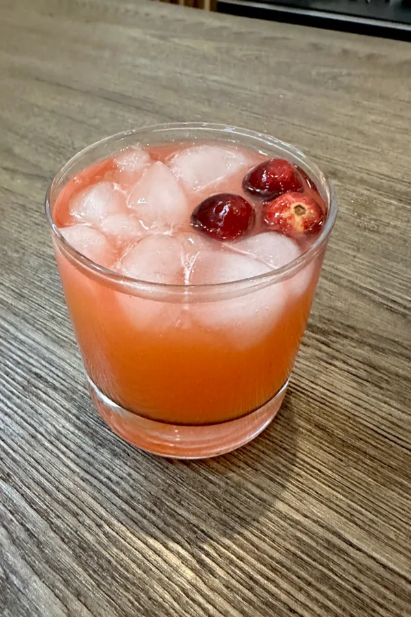 drink with cranberries floating inside 
