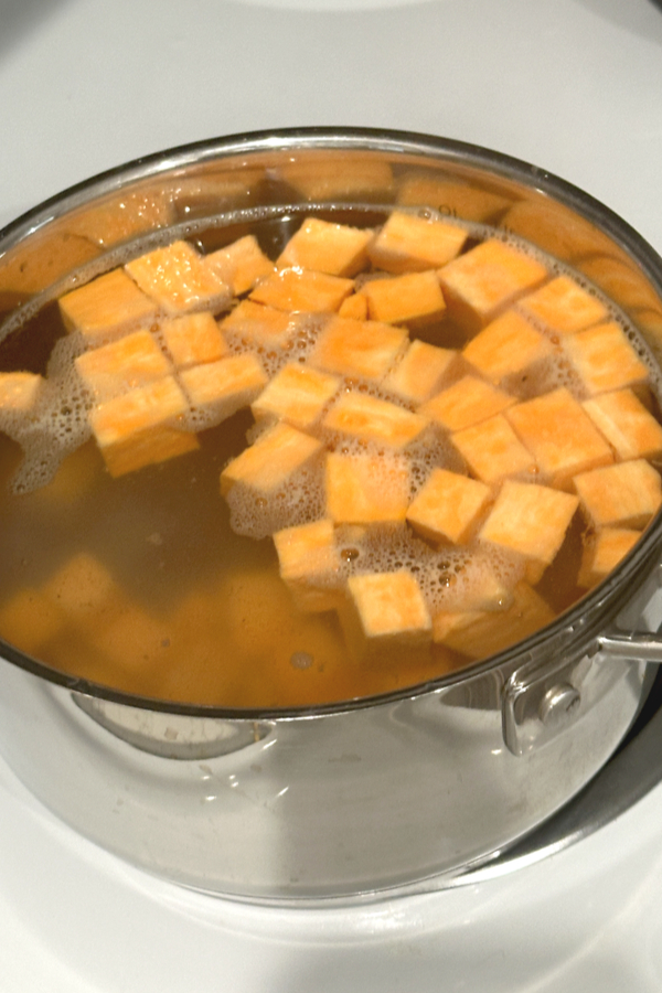 boiling sweet potato cubes