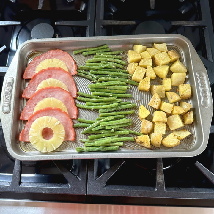 Sheet pan Christmas dinner with ham, green beans and potatoes