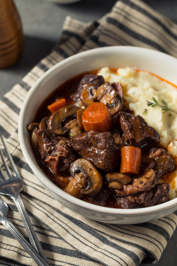 Beef burgundy served with mashed potatoes