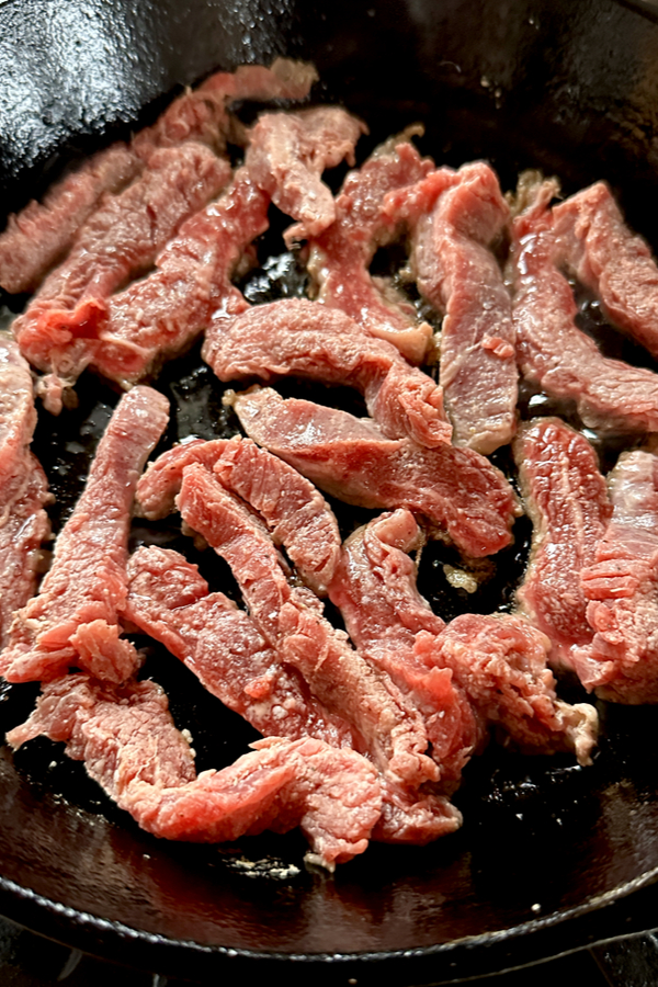 steak strips in skillet