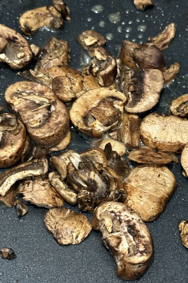 cremini mushrooms in skillet 