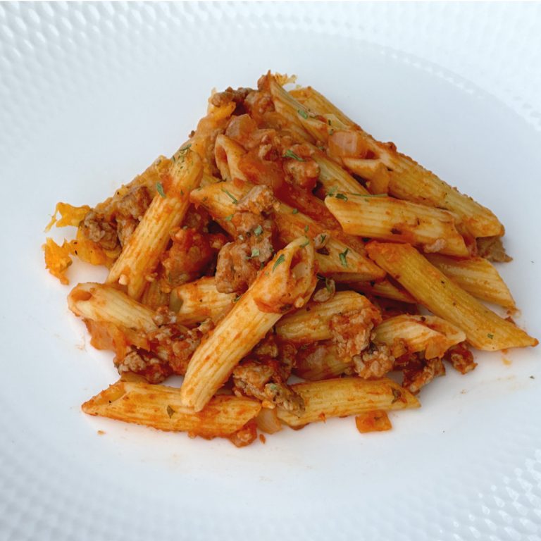 Ground beef casserole on white plate