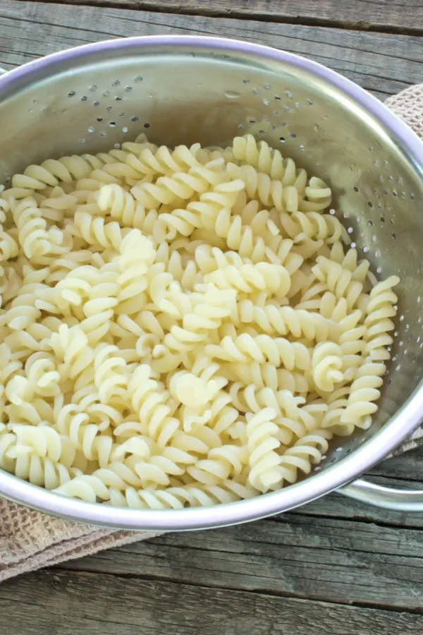 draining spiral pasta