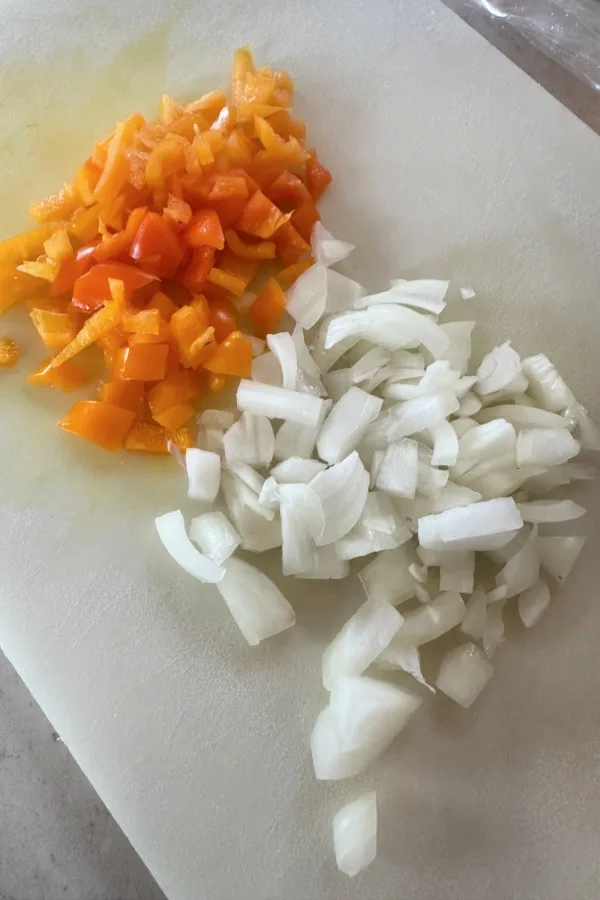 diced orange bell pepper and onion