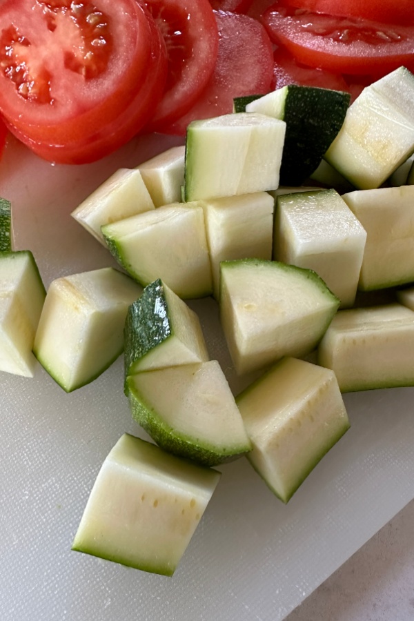 slices of tomato and chunks of zucchini