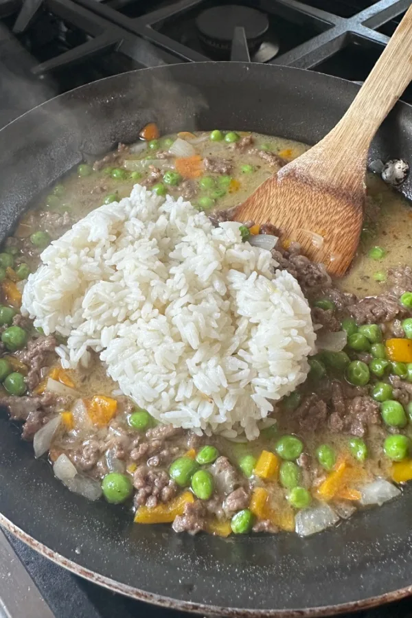 rice in skillet with veggies