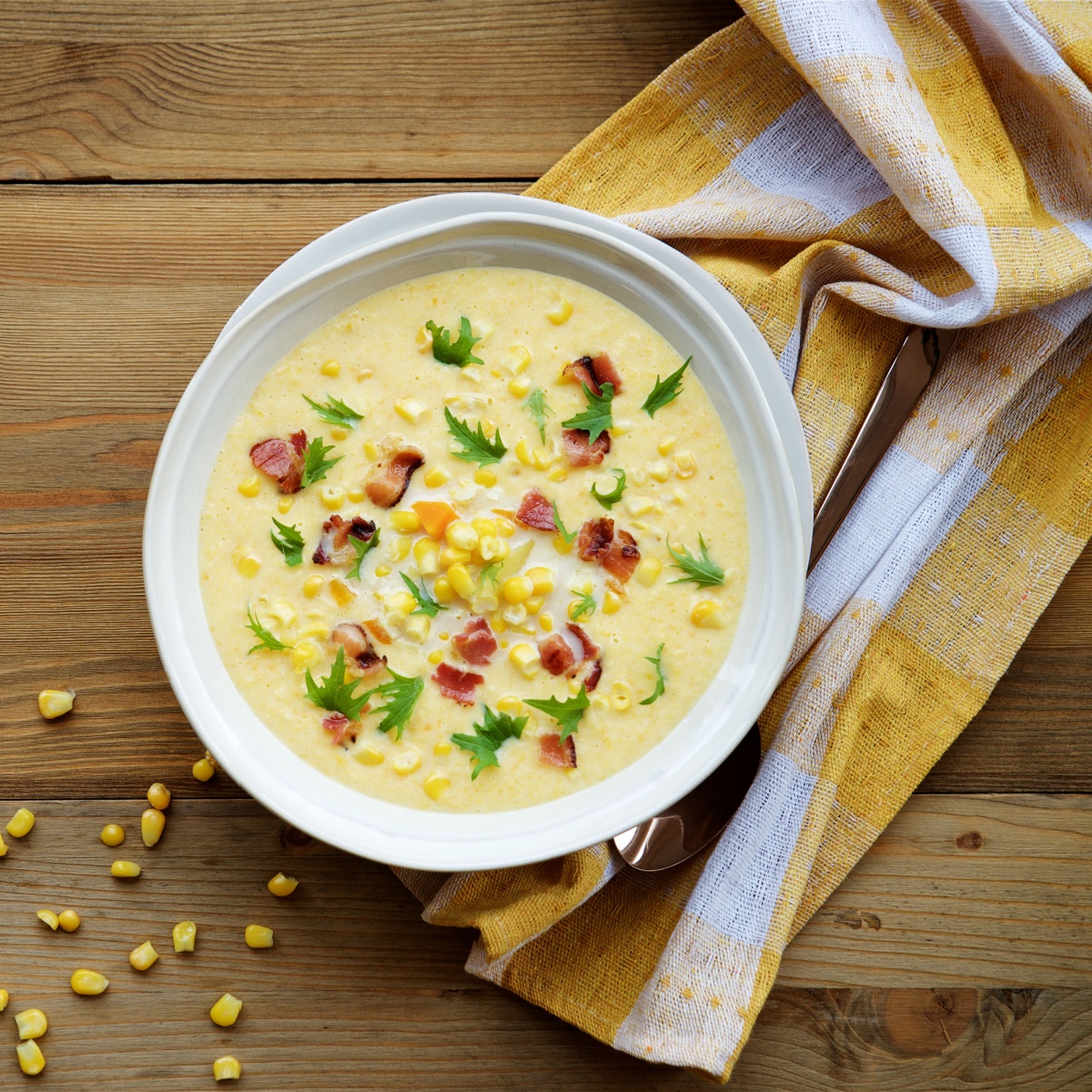 corn chowder in white bowl