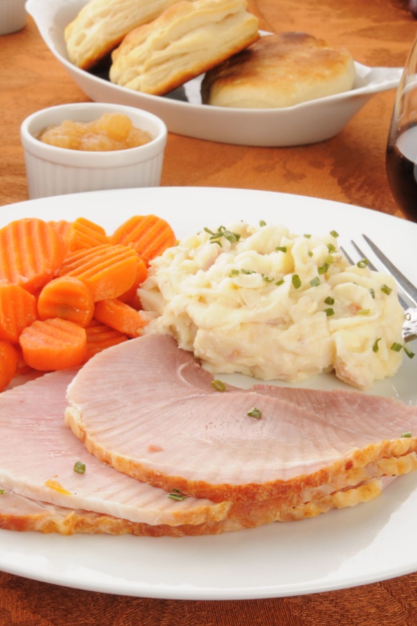 Christmas dinner plate with ham, carrots and Ranch mashed potatoes