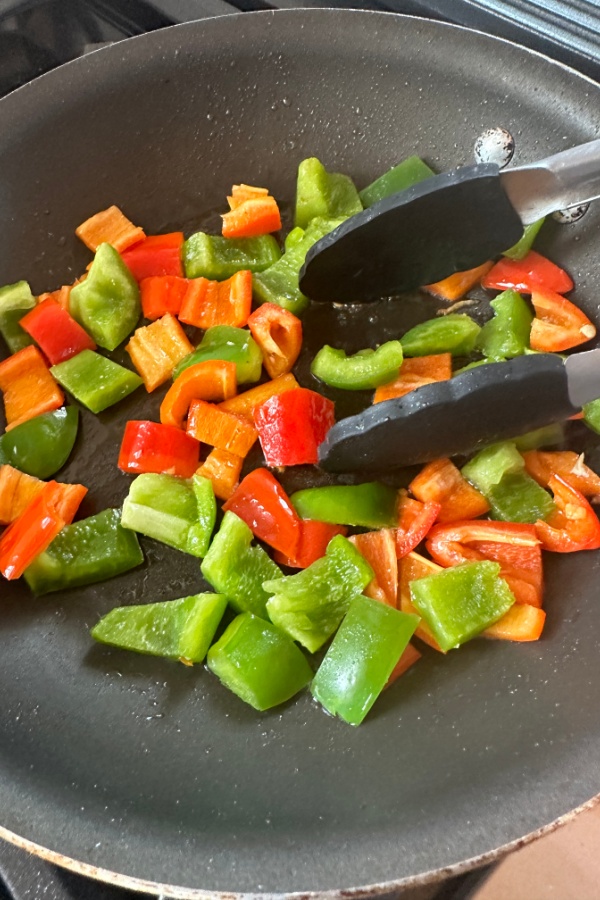 diced peppers in skillet