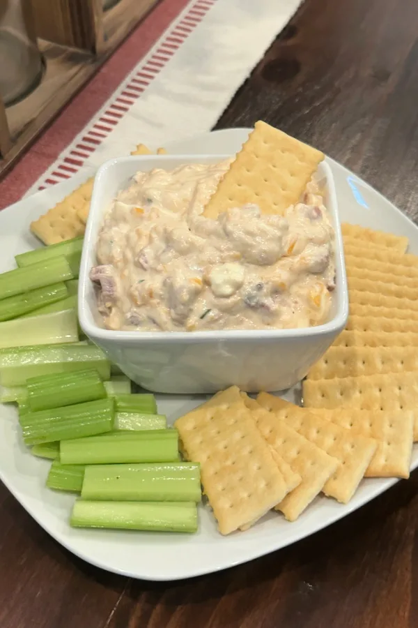 ham and cheese dip with crackers and celery