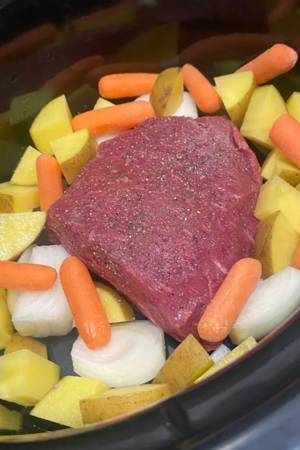 meat and veggies in slow cooker