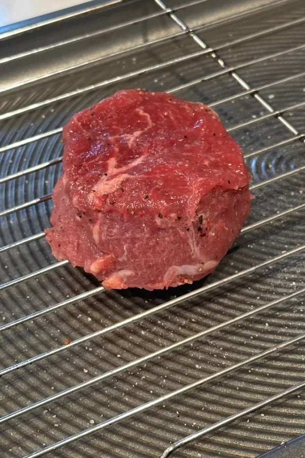 filet mignon steak on wire rack 