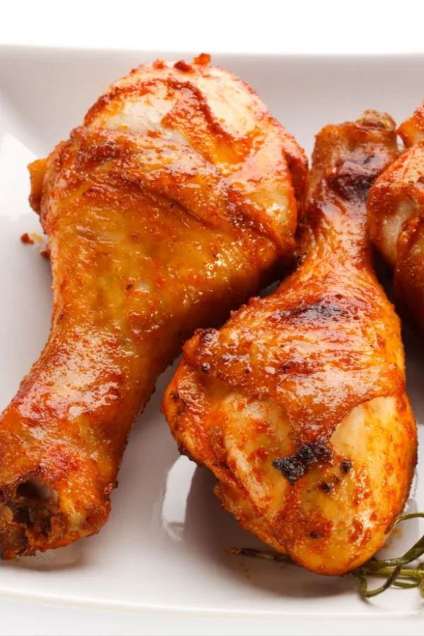 drumsticks on white plate
