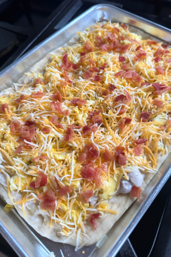 crumbled bacon on cheese