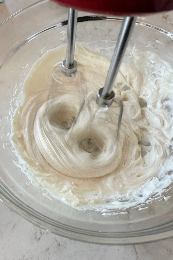 mixing cream cheese and Greek Yogurt