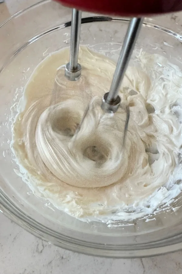 mixing cream cheese and Greek Yogurt