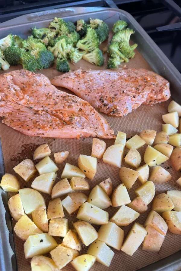 lemon chicken dinner on sheet pan